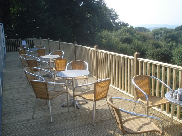 back porch patio with tables & chairs
