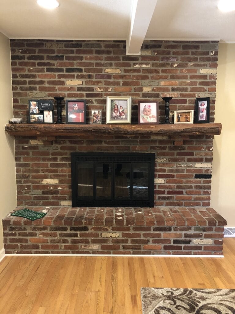fireplace surrounded by brick