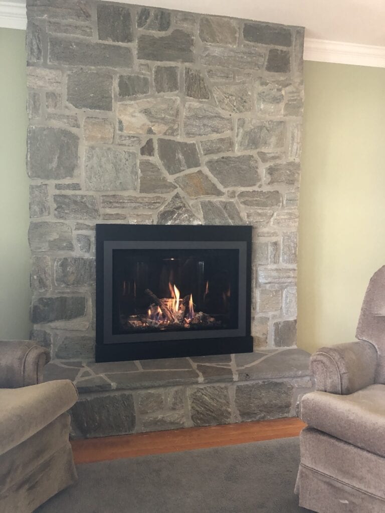 recliners in front of new fireplace