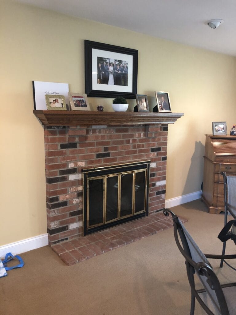 brick fireplace with mantel