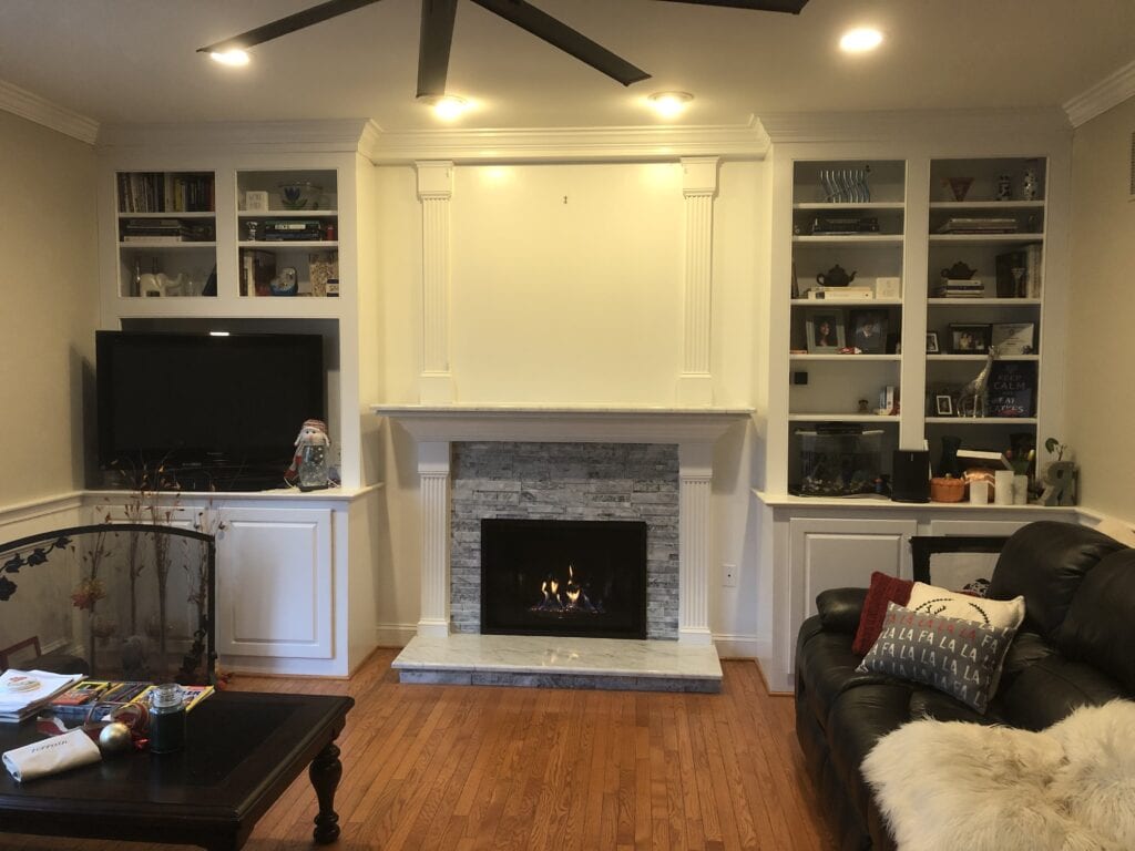 fireplace and built-in bookshelves