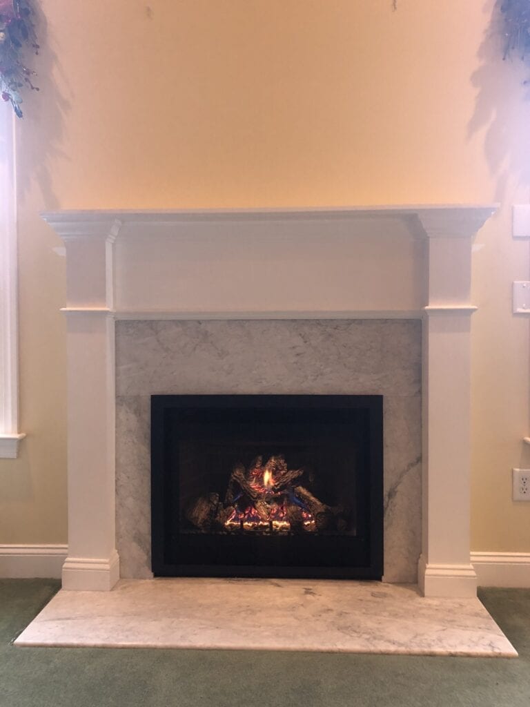 new gas fireplace on marble floor