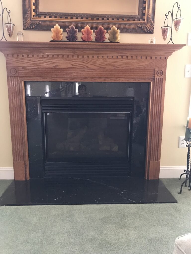 fireplace with wood mantel
