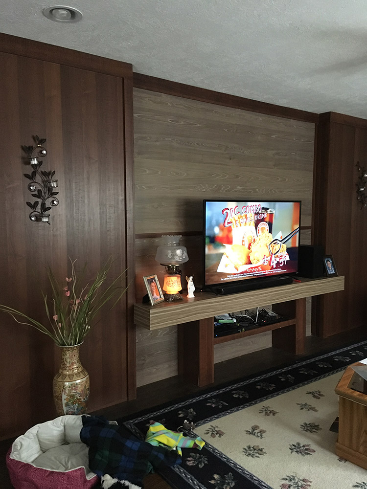 wood wall with mounted tv stand